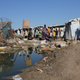 The UN refugee camp in Bentiu, a settlement of makeshift huts shrouded in fumes of sweat and feces.